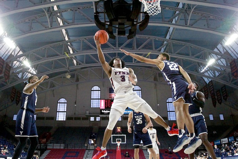 Jordan Dingle of Penn goes up for a shot against Matt Knowling of Yale on Jan. 22. Dingle scored 23 points in Friday night's win at Columbia.