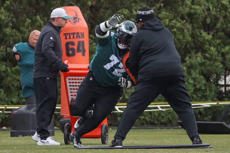 Recently signed defensive tackle Linval Joseph (72) runs a drill on Thursday during practice at the NovaCare Complex.