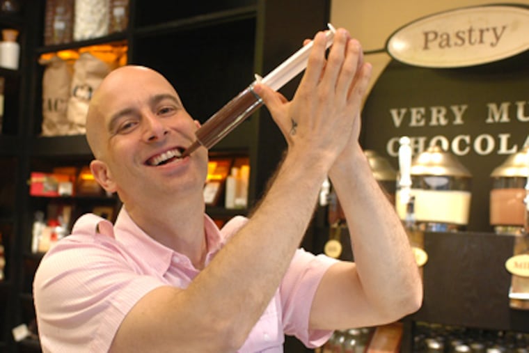 Max Brenner fashions himself a modern Willy Wonka at his new Chocolate Bar and Restaurant in Center City. (James Heaney / Staff Photographer)