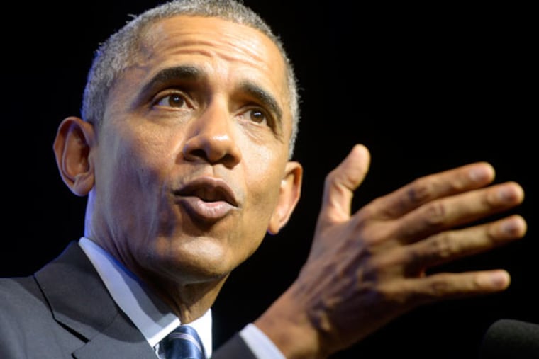President Obama addresses the 106th annual NAACP national conference at the Pennsylvania Convention Center. (TOM GRALISH / STAFF PHOTOGRAPHER)