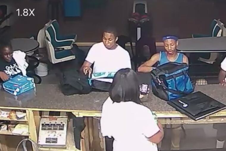 Alleged thieves captured on surveillance video inside St. Monica Lanes, 1601 W. Shunk Street, in South Philly. They are accused of taking cash, a laptop and other items from the church-run bowling alley on Friday, July 7, and Saturday, July 8, 2017.