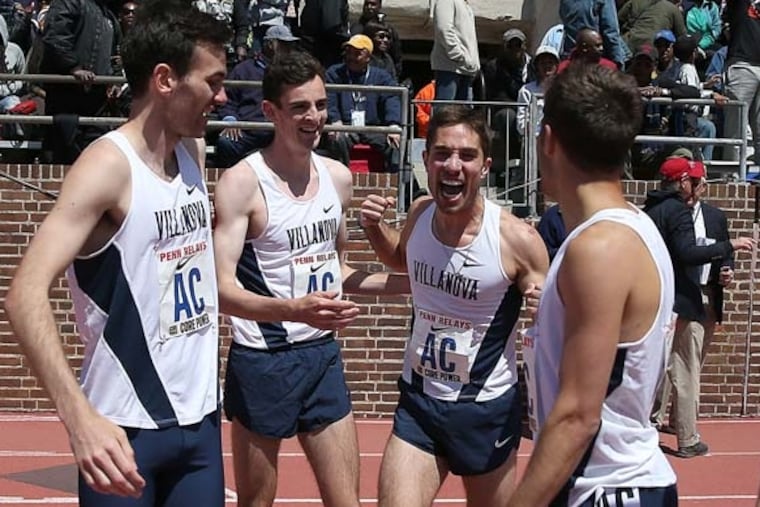 Patrick Tiernan (second from left) celebrates with his teammates after winning the college men's 4xmile relay at the 2015 Penn Relays. With him are Sam McEntee (left), Jordy Williamsz (second from right), and Rob Denault.