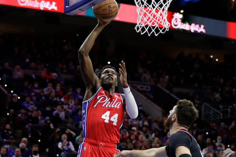 Sixers forward Paul Reed lays-up the basketball against the Portland Trail Blazers.