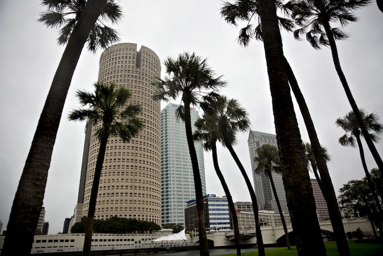 Office buildings stand in downtown Tampa, which could endure the burn of Hurricane Ian.