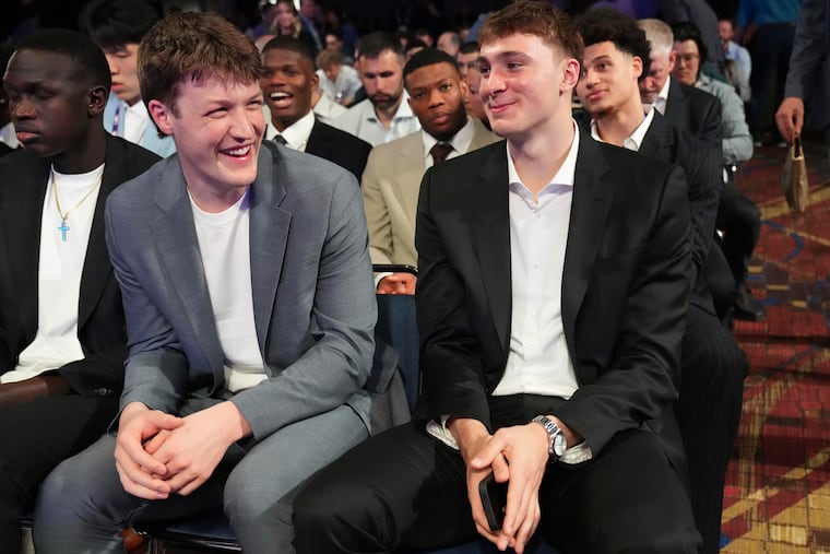 Duke's Kon Knueppel (left) and Cooper Flagg, the likely No. 1 pick, attend the NBA draft lottery in Chicago on Monday.