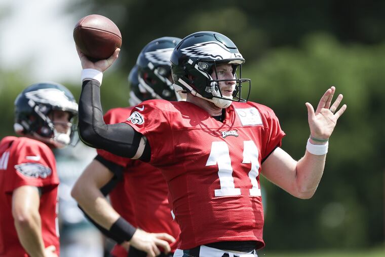 Carson Wentz throws during Sunday's Eagles practice at the NovaCare Complex.