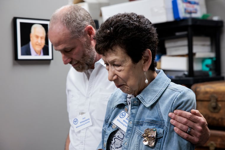 Jan Wittenberg hugs Bonnie Wittenberg during the dedication ceremony at the Holocaust Awareness Museum and Education Center on Sunday, Aug. 2, 2026 in Elkins Park. The Archives for Holocaust Education were dedicated in honor of longtime curator Donald Wittenberg.