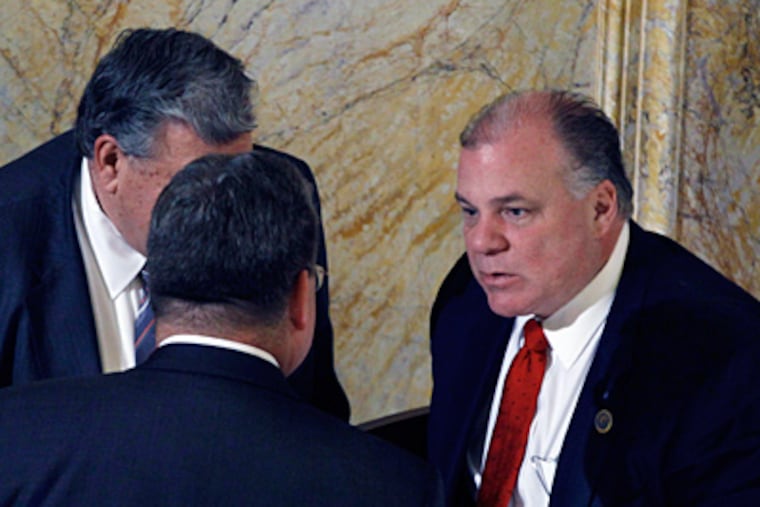 New Jersey Senate President Stephen M. Sweeney, right, D-Thorofare, listens to fellow Senators Anthony R. Bucco, left, R-Denville, and Steven V. Oroho, R-Sparta, in Trenton on Thursday as legislators considered a flurry of bills on the final day of this session. (Mel Evans / Associated Press)