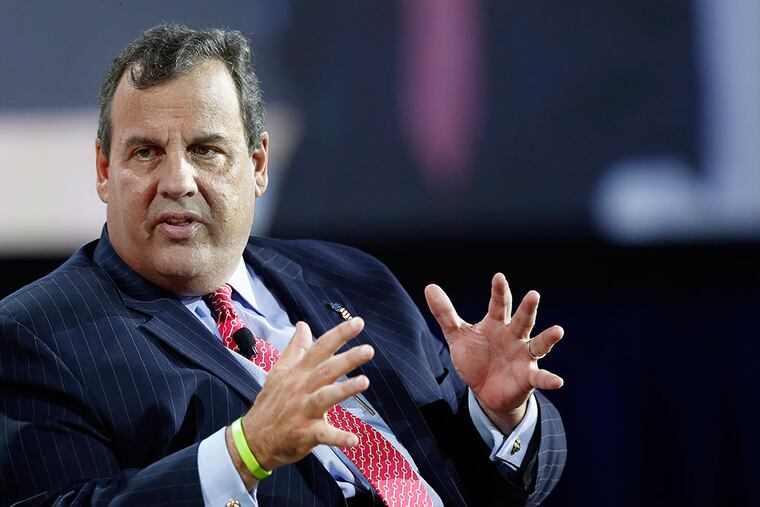 Gov. Christie at an education forum in Londonderry, N.H. He said teachers’ unions are “punching us all the time.” (AP Photo/Jim Cole)