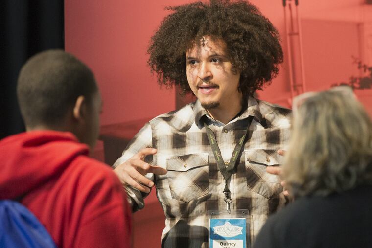 Quincy Ellis, an industrial designer, talks to the students about the special value of handmade products.