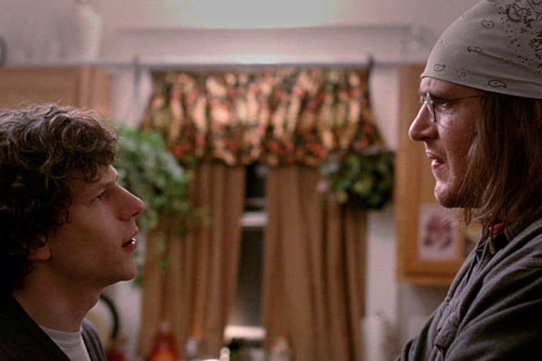 Jason Segel, right, plays David Foster Wallace, with Jesse Eisenberg, as David Lipsky, in "The End of the Tour," which premiered Friday.