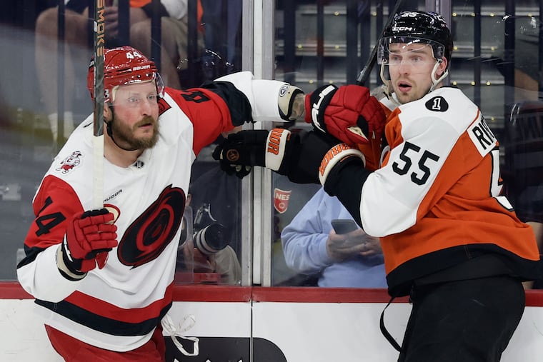 Former Flyer Nic Deslauriers (left), who is now with the Hurricanes, is in the awkward position of playing so many of his close friends this series.