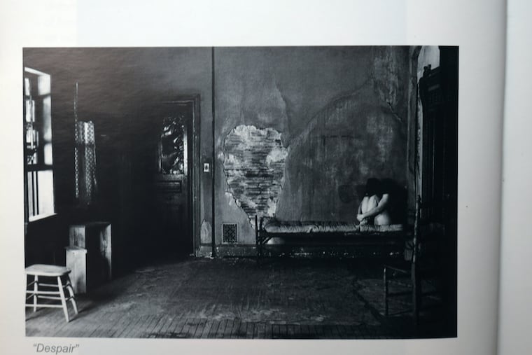 An unidentified woman in what appears to be Raymond "R.C." Horsch's home on Chew Avenue in Olney. The image is among several photographs in his book "Eroto: To The Prurient Interest,” Volumes I & II, reviewed by The Inquirer.