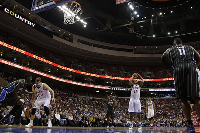 76ers swingman Evan Turner shoots a foul shot against the Magic. (Matt Slocum)
