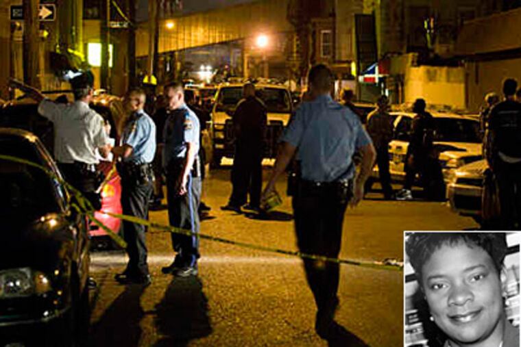 Patrol cars and officers converged in Kensington in July after a shootout. The District Attorney's Office is appealing rulings on 27 gun cases involving Judge Paula A. Patrick (inset). (File photo)