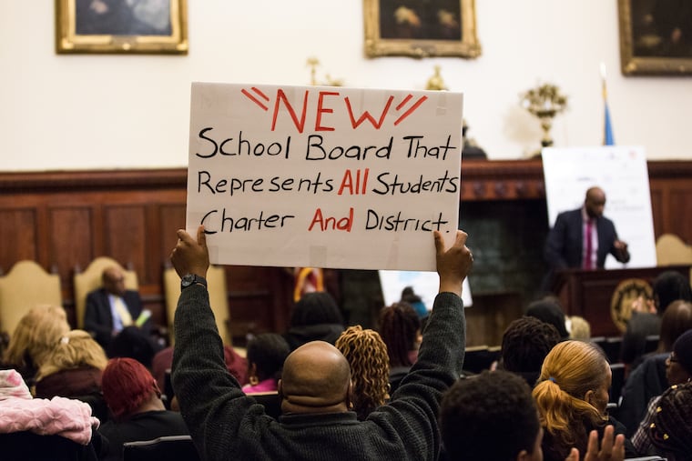 Charter school supporters gathered at City Hall earlier this year to demand representation on the new school board.