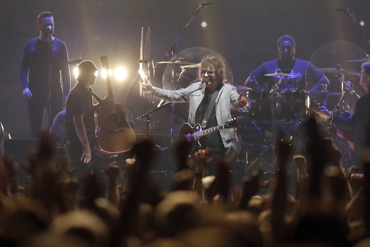 Jeff Lynne of ELO gives a thumbs up to the crowd after singing Evil Woman during ELO's concert at the Wells Fargo Center in Phila., Pa. on Aug. 24, 2018.