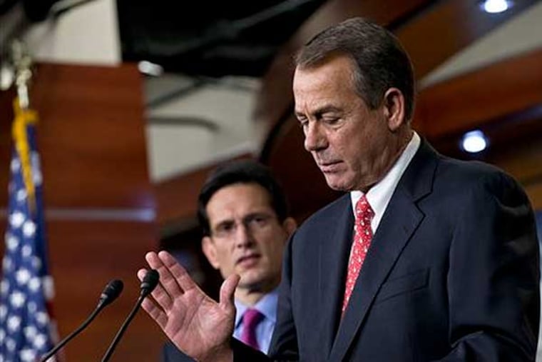 FILE - In this Friday, Dec. 21, 2012, file photo, speaker of the House John Boehner, R-Ohio, joined by House Majority Leader Eric Cantor, R-Va., left, speaks to reporters about the fiscal cliff negotiations at the Capitol in Washington. Lawmakers probably could enact a compromise quickly and easily if Republican leaders let Democrats provide most of the votes. By trying to pass his plan with GOP votes alone, Boehner could afford to lose only two dozen of the 241 House Republicans. His private head-count found nearly twice that many defectors, party insiders say, forcing Boehner to give up without seeking a formal vote. (AP Photo/J. Scott Applewhite, File)