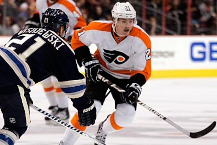 Flyers forward James van Riemsdyk broke a bone in his foot on Thursday night. (Tom Mihalek/AP file photo)