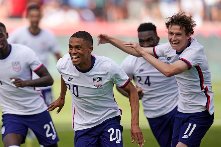 Brenden Aaronson (right) and Reggie Cannon (left) scored goals in the United States' win.