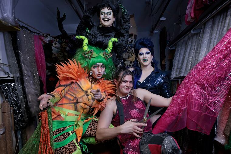 Drag performers “Henlo Bullfrog” Joy Taney (front left), “Miss Thing” Cy Rockoff (top left), Sabine Strosser (front right) and “Iris Spectre” Dylan Kemp (top right) at Fleishman Fabrics & Supplies, 737 S 4th St in Philadelphia on Wednesday, April 17, 2024. The drag queens designed several of Sapphira Cristál's "RuPaul's Drag Race" runway looks with the fabrics and materials coming from Fleishman’s.