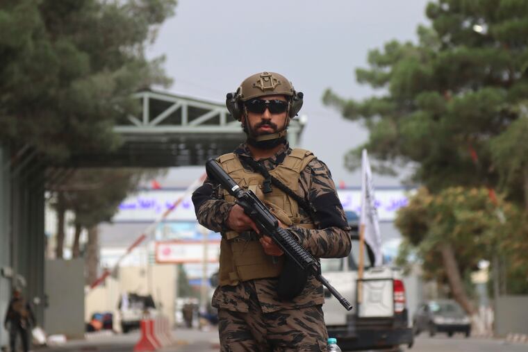 Taliban special forces fighters arrive inside the Hamid Karzai International Airport after the U.S. military's withdrawal, in Kabul, Afghanistan, on Tuesday.