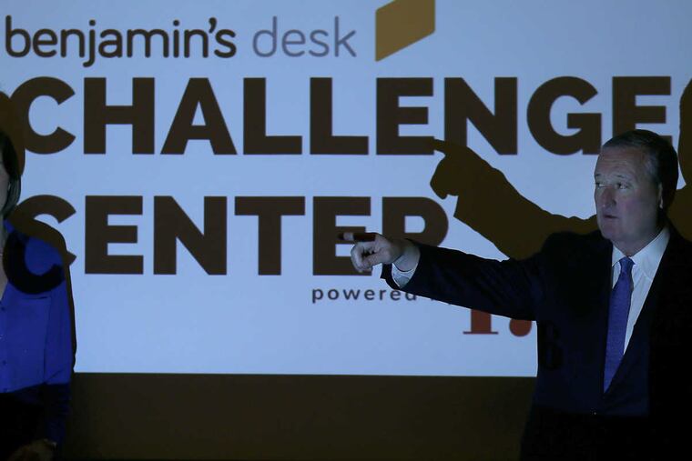 Mayor Jim Kenney, right, points over a projection screen during a news conference to announce the alliance between Benjamin's Desk and Washington-based 1776 in City Hall in Philadelphia on May 2, 2017. DAVID MAIALETTI / Staff Photographer