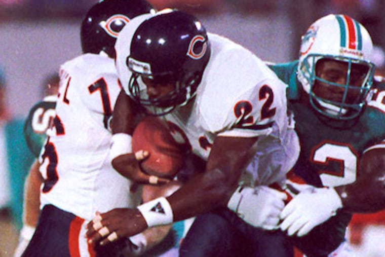 The Chicago Bears' Dave Duerson (center) committed suicide last year after having trouble with words and remembering names. ASSOCIATED PRESS
