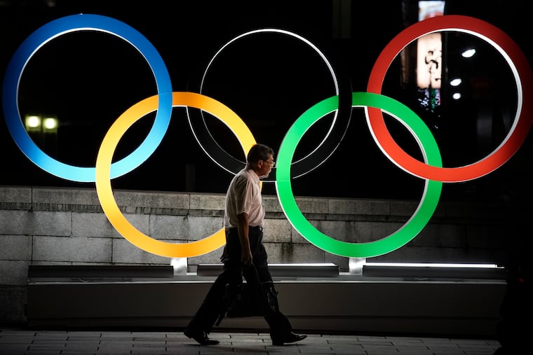The Olympic rings on display in Tokyo in July.