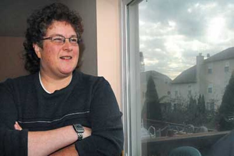 Deb Shapiro of Souderton is thankful that her flight on US Airways Express-Piedmont Airlines from Allentown to Philadelphia on Nov. 16 landed safely. (Sharon Gekoski-Kimmel / Staff Photographer)