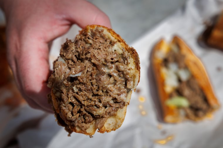 Detail shot of a cheesesteak with Cooper Sharp from Angelo's Pizzeria, 736 S. Ninth Street, on April 25, 2025.