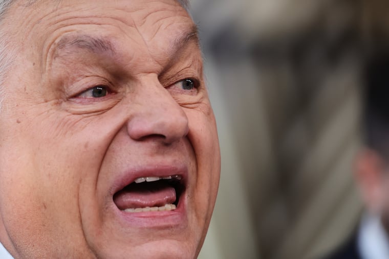 Hungary's Prime Minister Viktor Orban speaks with the media as he arrives for the EU summit at the European Council building in Brussels, Thursday, March 19, 2026. (AP Photo/Omar Havana)