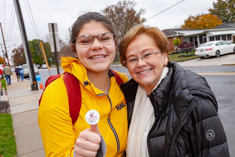 President Ensign and first-year student Hannah Ableman, who voted in the midterm elections.