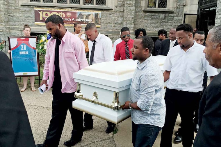 Pallbearers carry the casket. Among those in attendance were Mayor Kenney and Florida Sen. Marco Rubio.