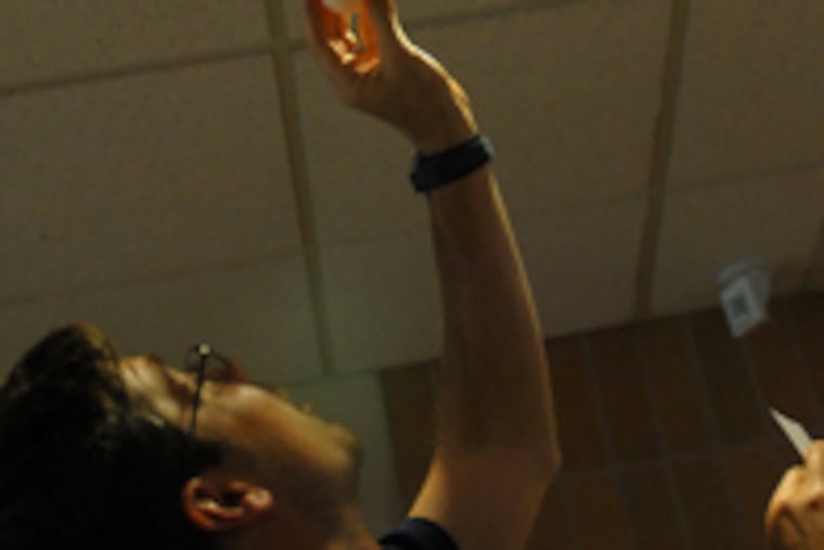 Looking for a thick shell, Jason Sullivan of Skillman, N.J., selects an egg for his modeling lesson.