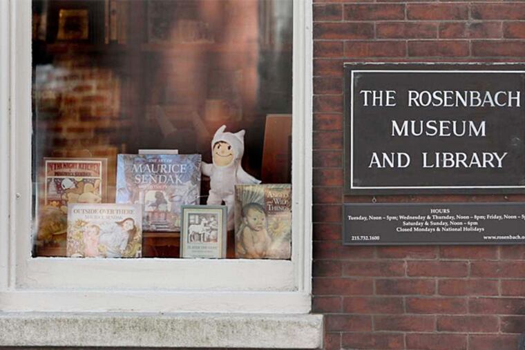 Sendak books and other items for sale displayed in the window of the Rosenbach Museum. (David M. Warren/Staff Photographer)