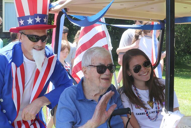 Mr. Jones, at center, acts as the Grand Marshal of the 4th of July parade at Lake Paupac in the Poconos in Monroe County. The photo was taken in 2017.