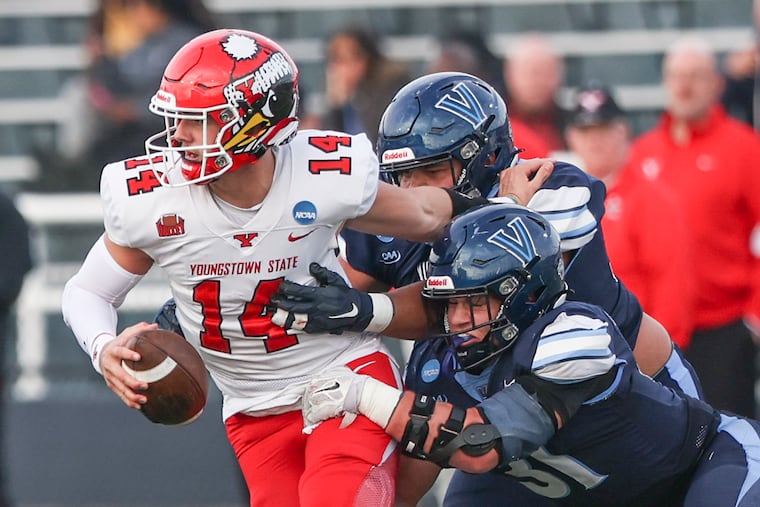 Villanova linebacker Shane Hartzell, right, seen here in action earlier this season, recorded a game-high 20 tackles in the Wildcats' homecoming day win over New Hampshire on Saturday.