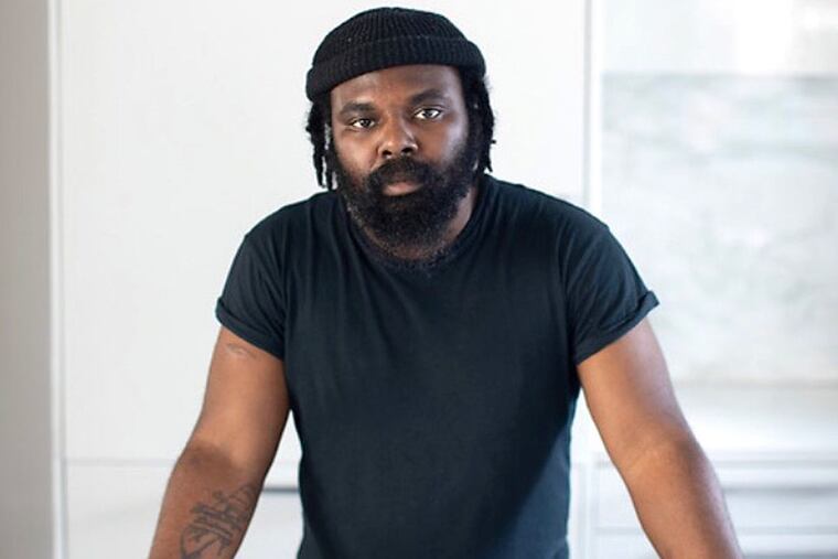 Omar Tate, a chef and artist, grew up in Germantown.