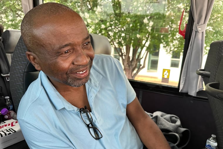 Keith Odom, a forklift driver from Aiken, S.C., looks out from his bus seat as he arrives in Montgomery, Ala., for a voting rights rally Saturday, May 16, 2026.