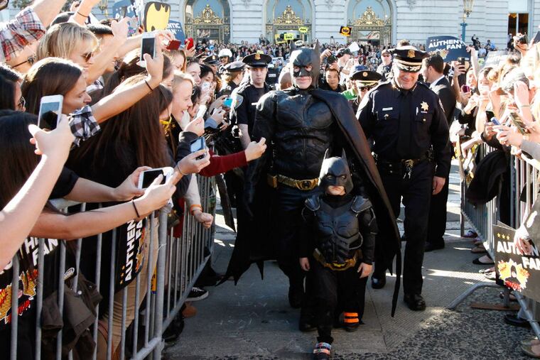 “Batkid” Miles Scott, 5, embarks on crime-solving adventures in the film “Batkid Begins.” (PAUL SAKUMA / Make-A-Wish Foundation, Warner Bros. Entertainment Inc)