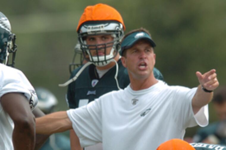 John Harbaugh has moved from directing the special teams as he did last August to taking over the defensive secondary.