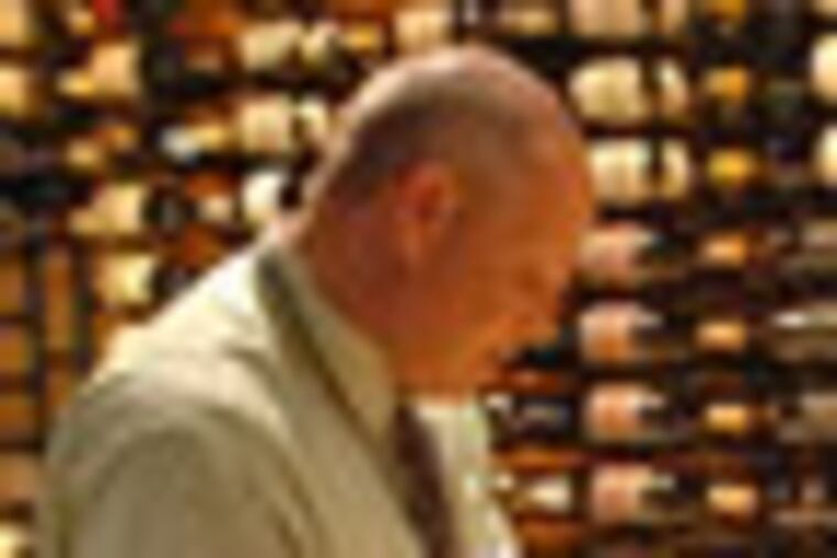 David Root, manager of the Media Wine and Spirit Shop, compiles a "bin list" as he restocks the premium wine room in his store. (Photo by Clem Murray / Inquirer) EDITORS NOTE: PE1Liquor29-a 8/28/2008 The Pennsylvania Liquor Control Board is planning to execute an extreme makeover on most of its 620 stores, which run the gamut from not-terrible-looking to downright dumpy. The LCB has hired an outside company to help it redo the stores' image and reputation so that they finally stop being the unwanted recipient of ridicule. We talk to customers and employees at some of the region's liquor stores to see what they think about the LCB's latest PR effort. 1 of 2 Reporter is Angela Couloumbis and Mari Schaefer.