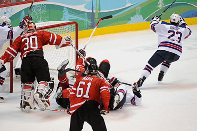 Chris Drury celebrated after his goal gave the U.S. a 3-2 lead during the second period. (Clem Murray/Staff Photographer)