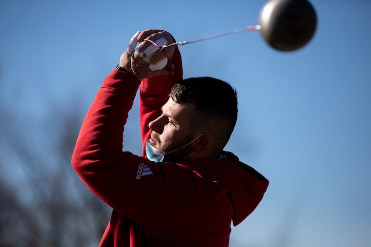 Jude Misko, 24, a graduate student and hammer thrower at Rutgers-Camden, trains regularly outside Winslow Township High School in Camden County.