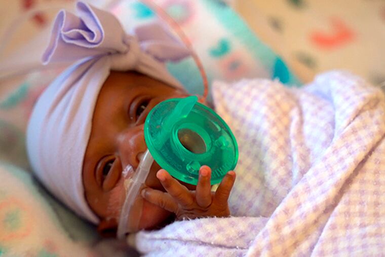 This March, 2019 photo provided by Sharp HealthCare in San Diego shows a baby named Saybie. Sharp Mary Birch Hospital for Women & Newborns said in a statement Wednesday, May 29, 2019, that Saybie, born at 23 weeks and three days, is believed to be the world's tiniest surviving baby, who weighed just 245 grams (about 8.6 ounces) before she was discharged as a healthy infant. She was sent home this month weighing 5 pounds (2 kilograms) after nearly five months in the hospital's neonatal intensive care unit. (Sharp HealthCare via AP)