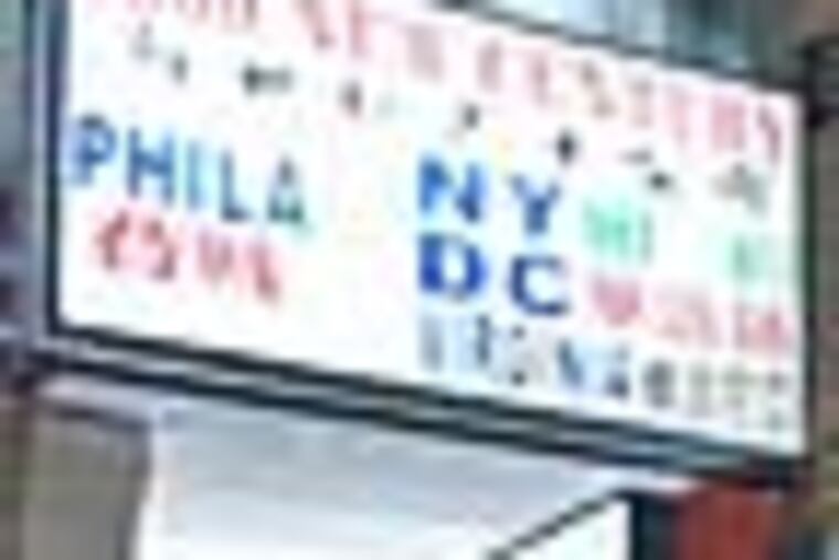 New Century bus company offices in Chinatown, shut down Thursday by federal regulators for safety violations. Staff photo by Paul Nussbaum.