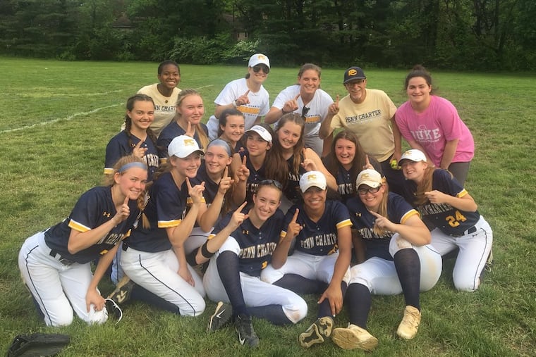 Penn Charter softball celebrates after winning the Inter-Ac title.