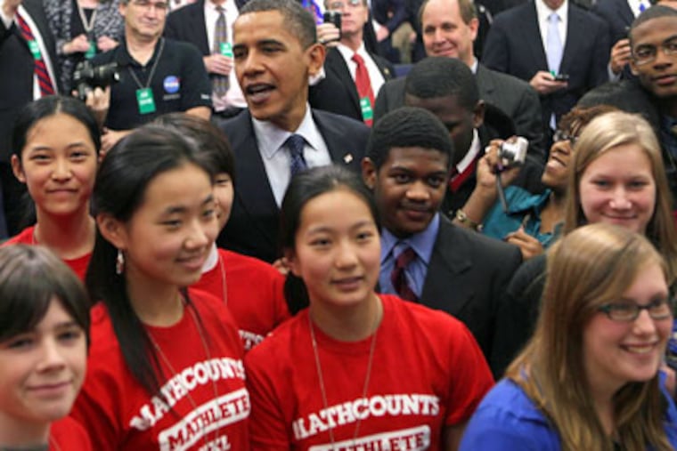 Obama launched the "Educate to Innovate" campaign to help boost US students' achievements in science and math. The initiative includes a partnership with the television program Sesame Street which will air science driven episodes. (Dennis Brack-Pool / Getty Images)
