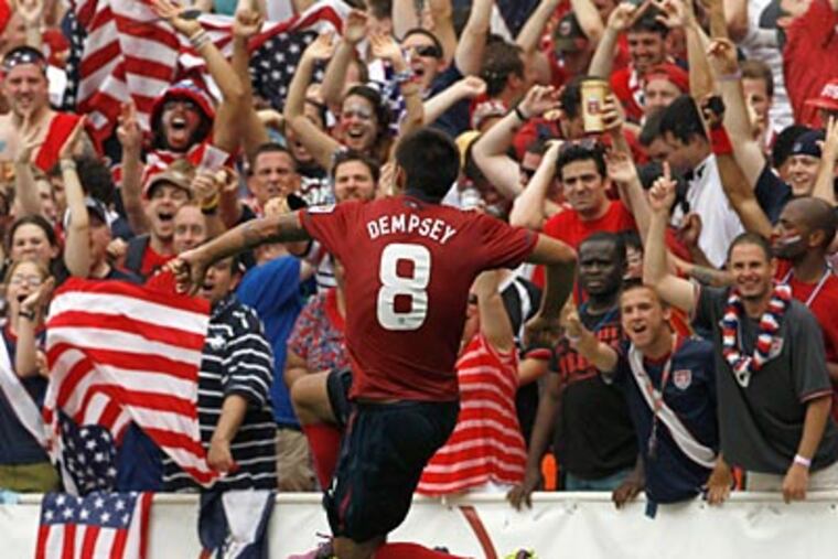 Clint Dempsey celebrates after scoring against Jamaica in the United States' victory. (Alex Brandon/AP Photo)